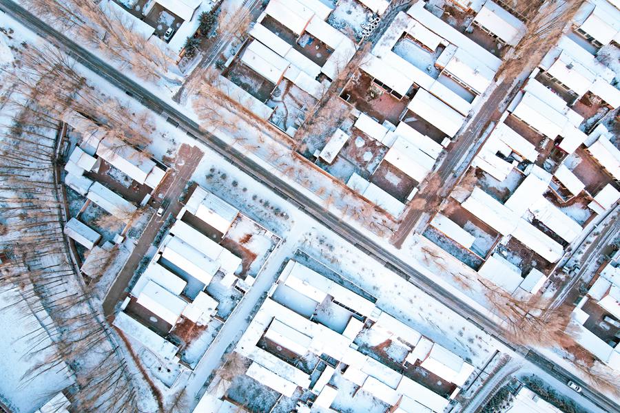 雪后的村落一隅。陳思宏攝